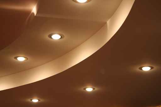 A ceiling with lights on it and some walls